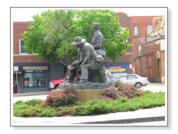  bronze sculpture at a Westport intersection 