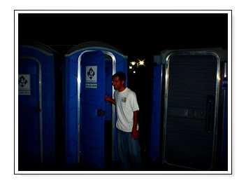  Nick coming out of a port-a-john 